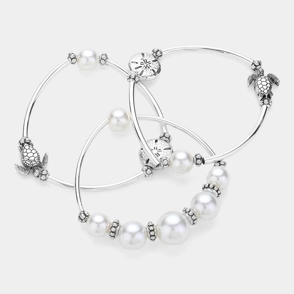 iLLASPARKZ 3PCS - Antique Metal Sea Turtle Sand Dollar Pointed Pearl Stretch Multi Layered Bracelets
