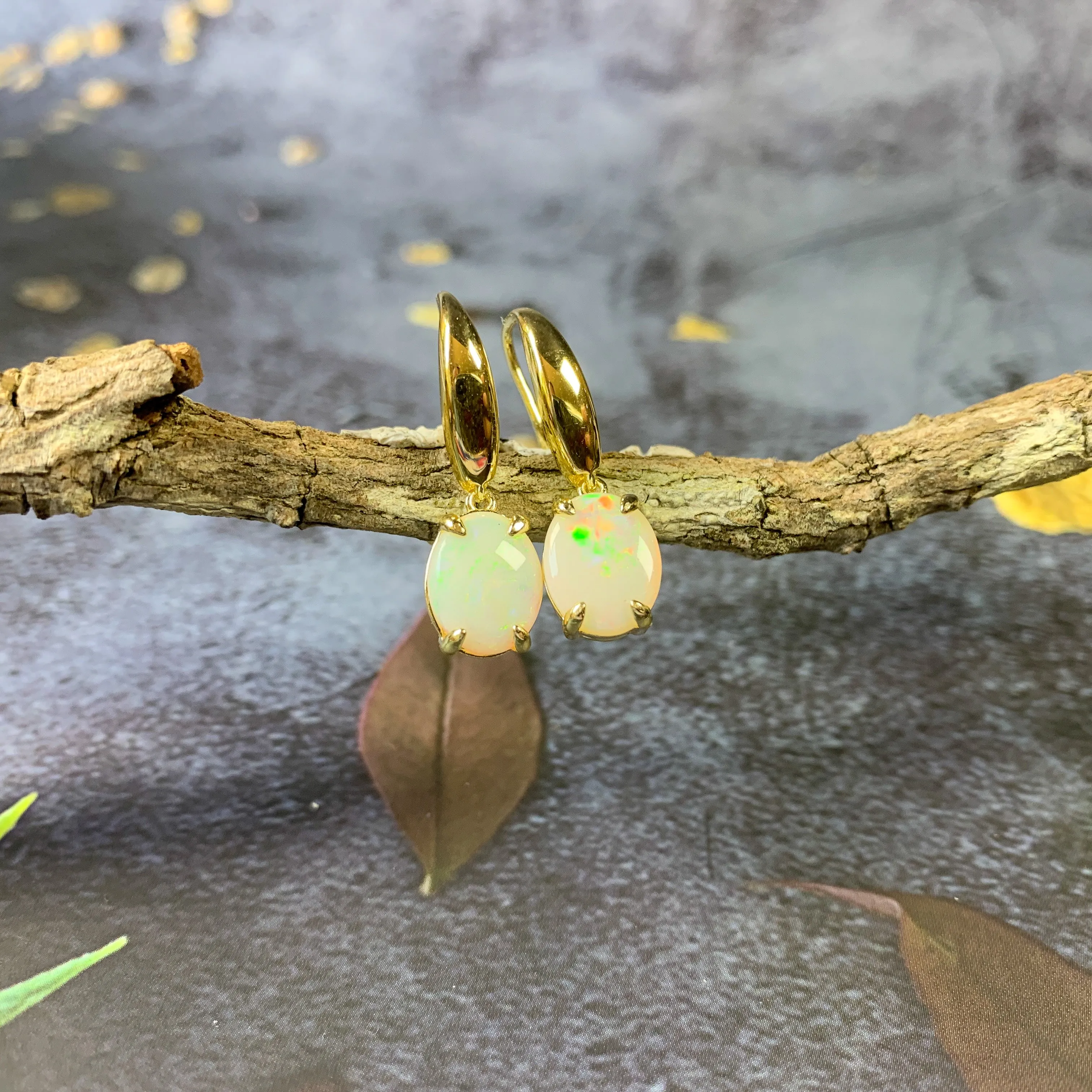Sterling Silver Gold plated dangling 10x8mm White Opal earrings
