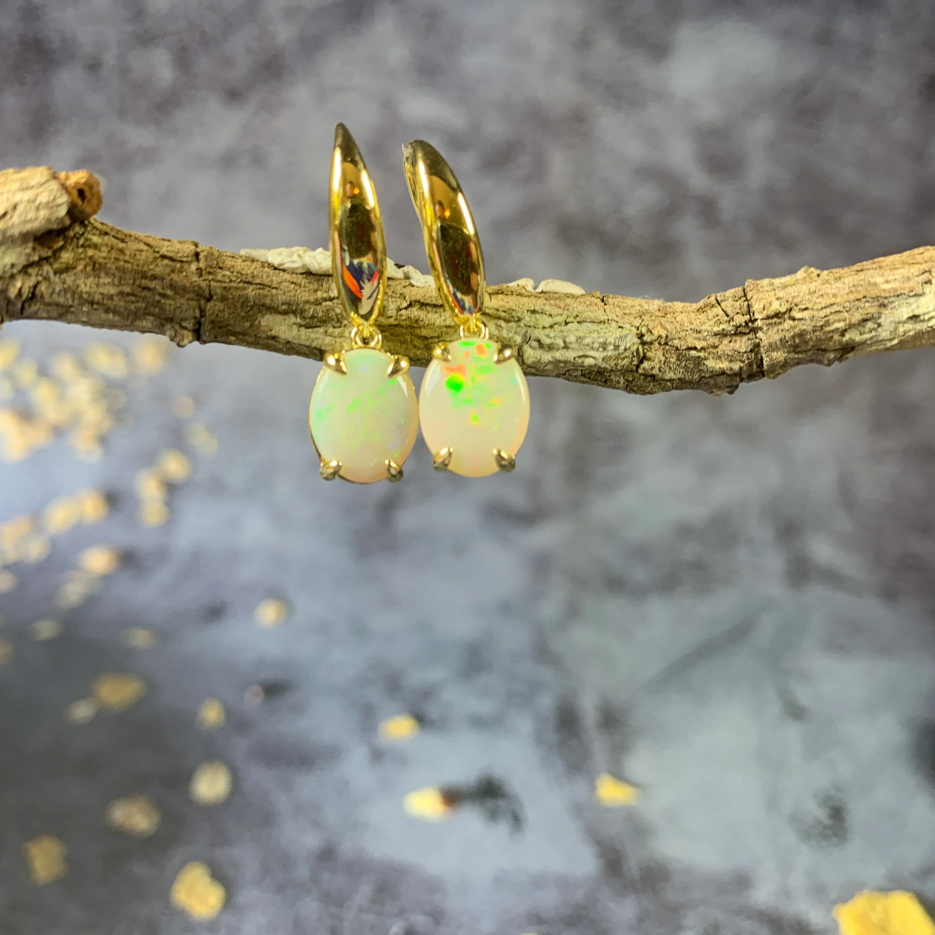 Sterling Silver Gold plated dangling 10x8mm White Opal earrings